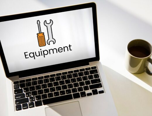 an open laptop with two tool icons and the word “Equipment” on the screen