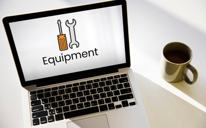 an open laptop with two tool icons and the word “Equipment” on the screen