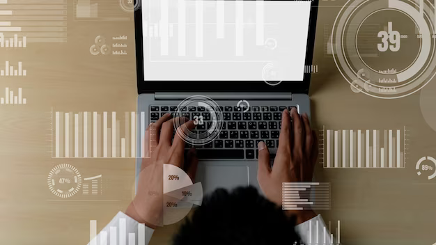 Man working at a computer, top view