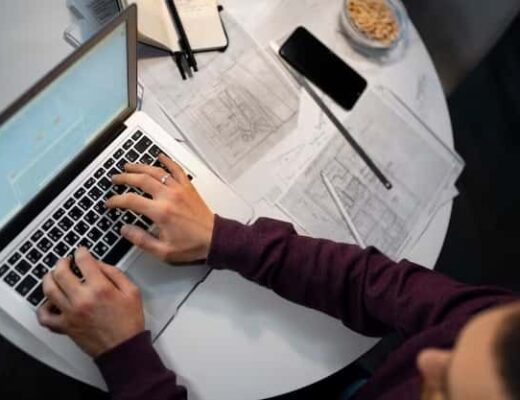 Man working at a computer, top view