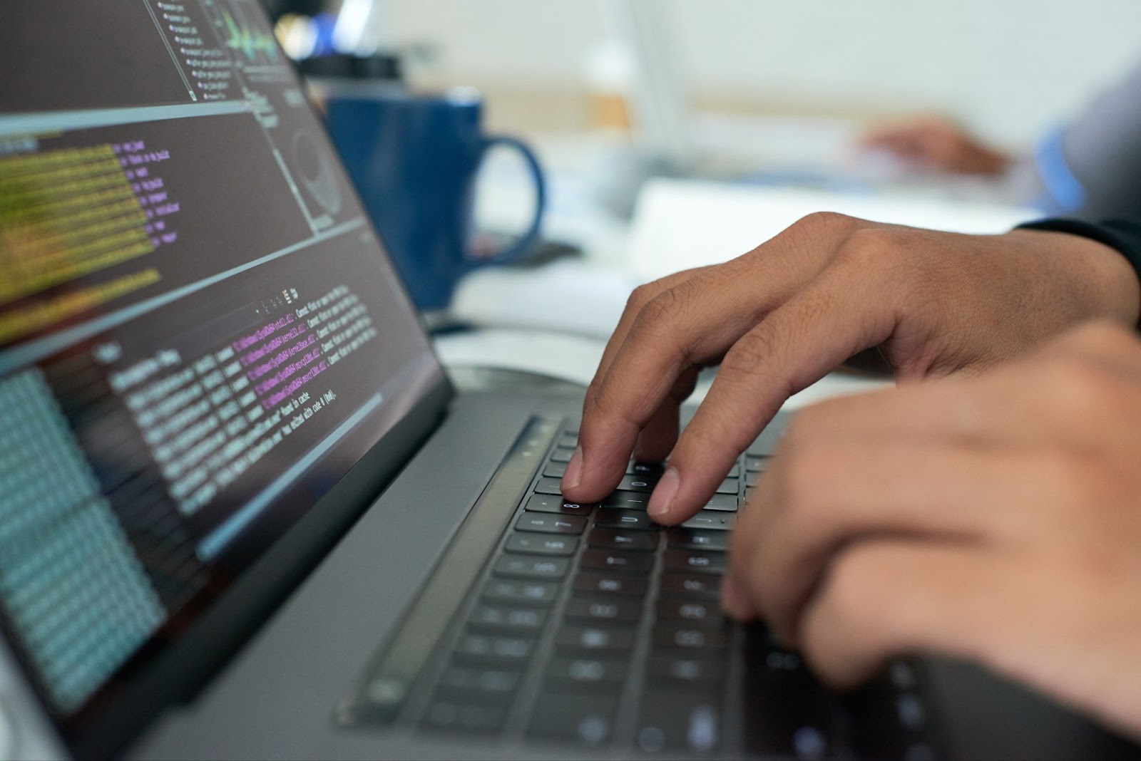 Close up of man working with code