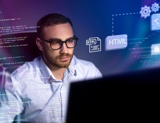 Man working on laptop with testing